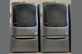 a thumdnail for published video. Front loading washing machine at high speed spin cycle.
