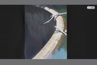 a thumdnail for published video. Motion of an old dam of a water reservoir - amplified 100*98 times